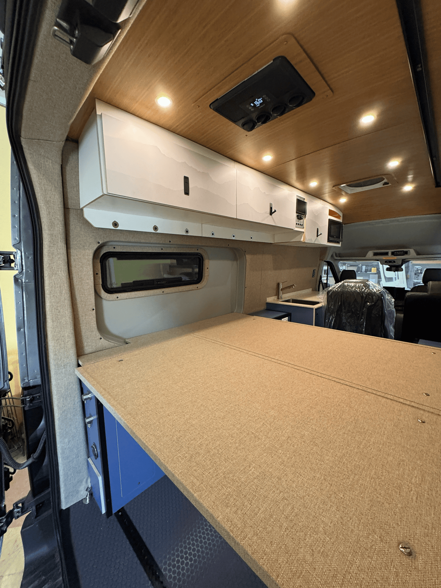Ford Transit Innie Sleeper: Driver - Side - Featherbuilt