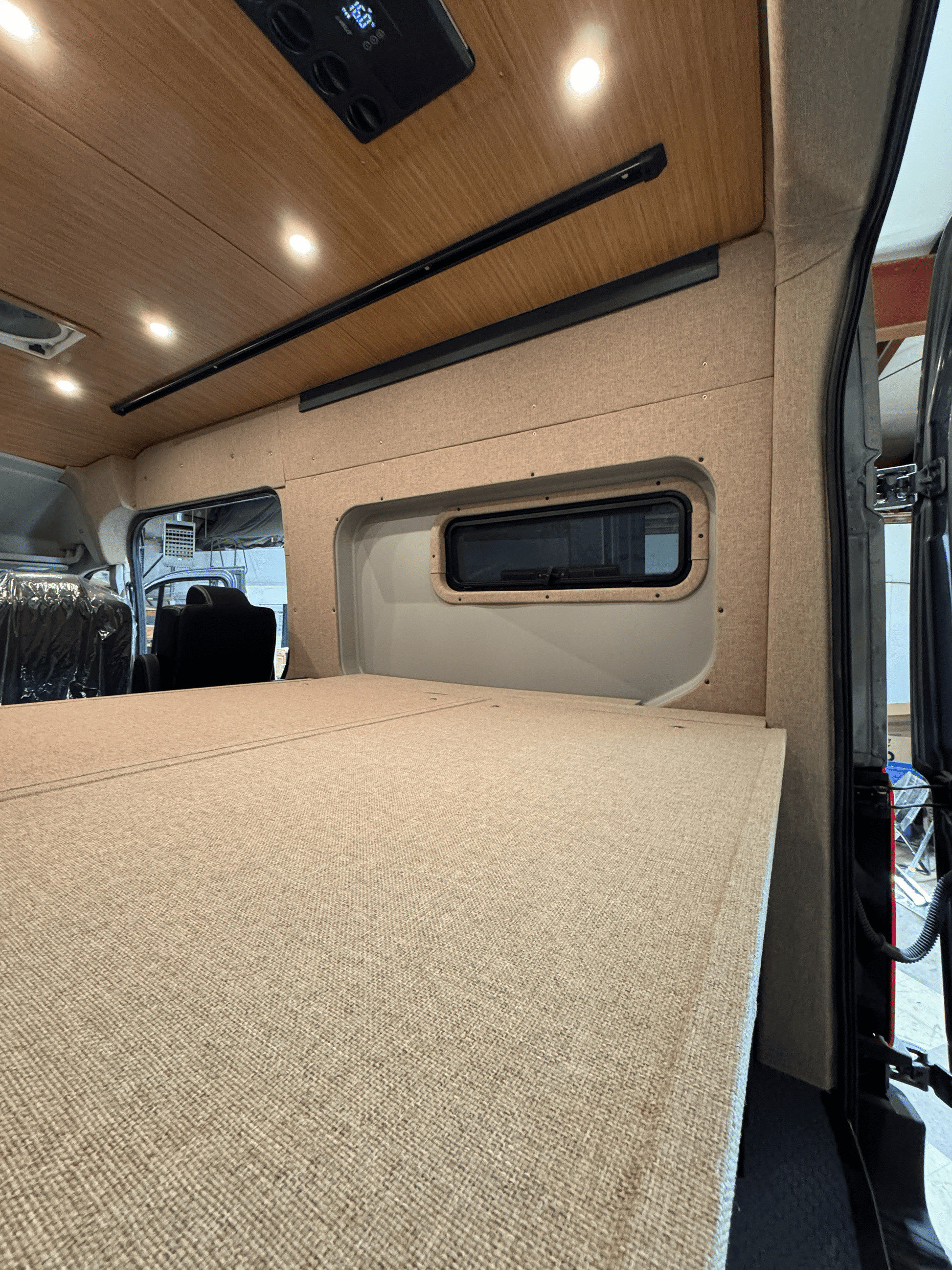 Ford Transit Innie Sleeper: Passenger - Side - Featherbuilt